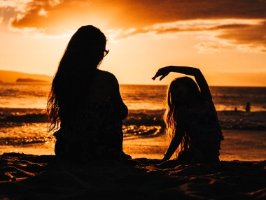 mother and daughter at the beach